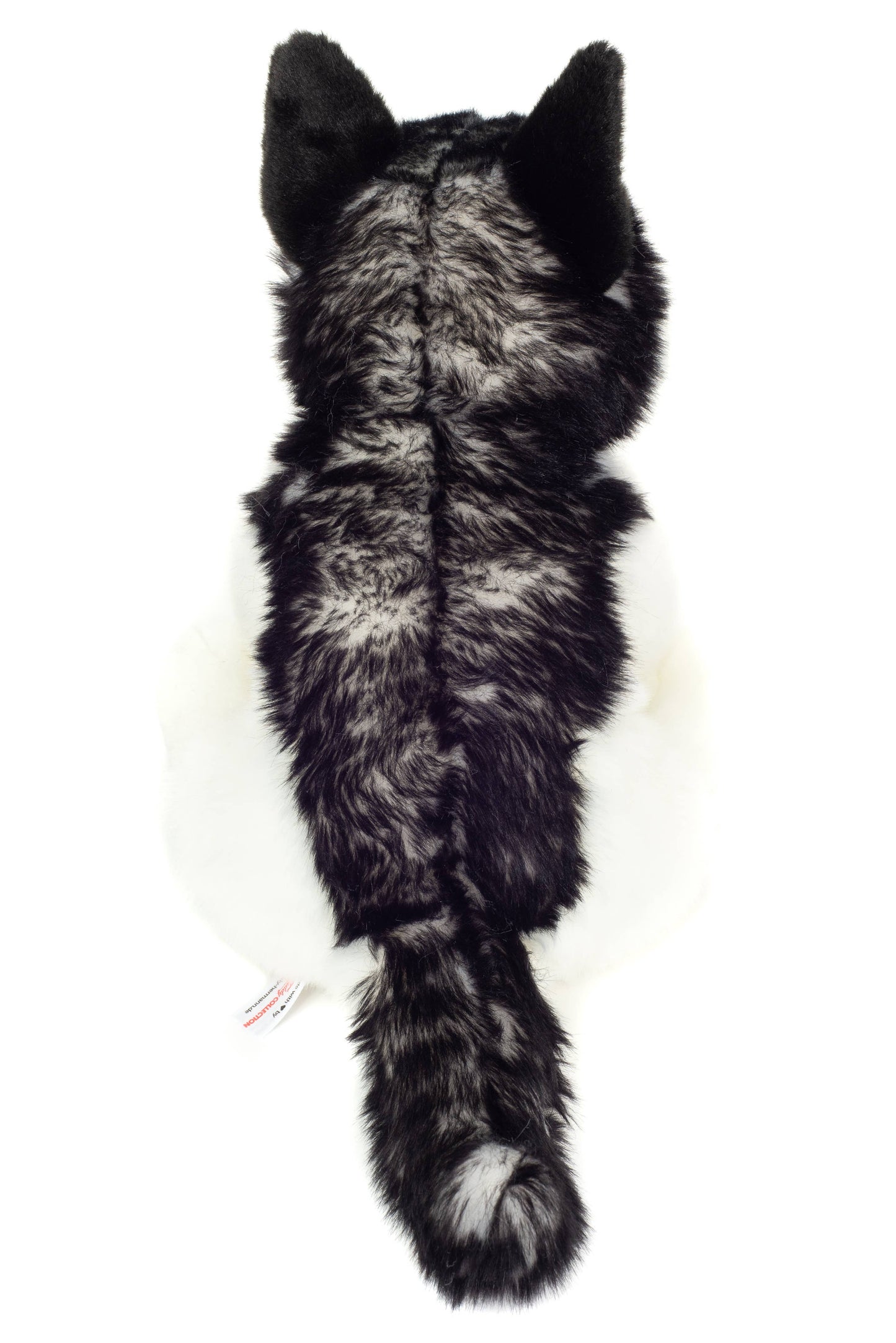 Pluche knuffel van een zittende husky