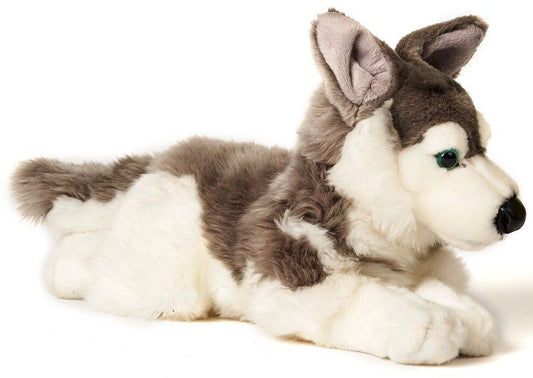 Peluche de husky gris acostado