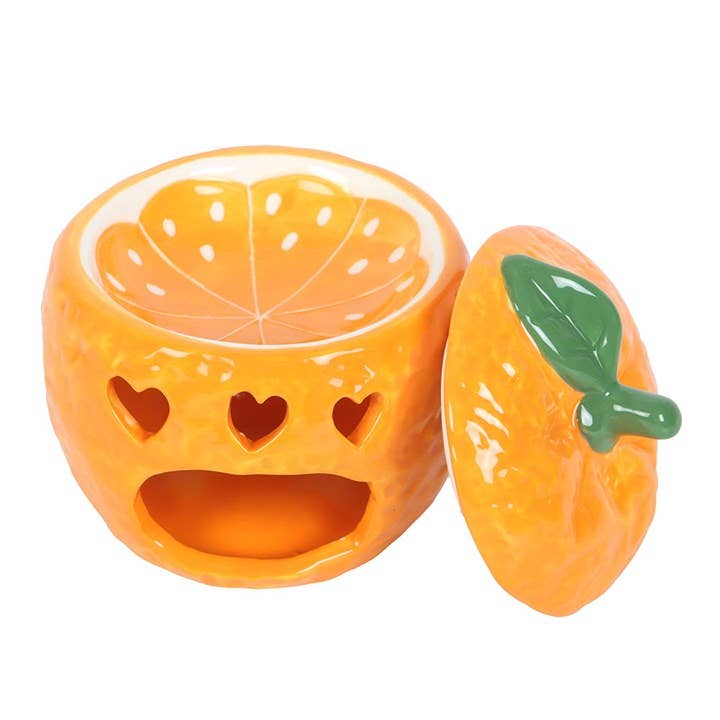Oil burner shaped like a freshly picked orange
