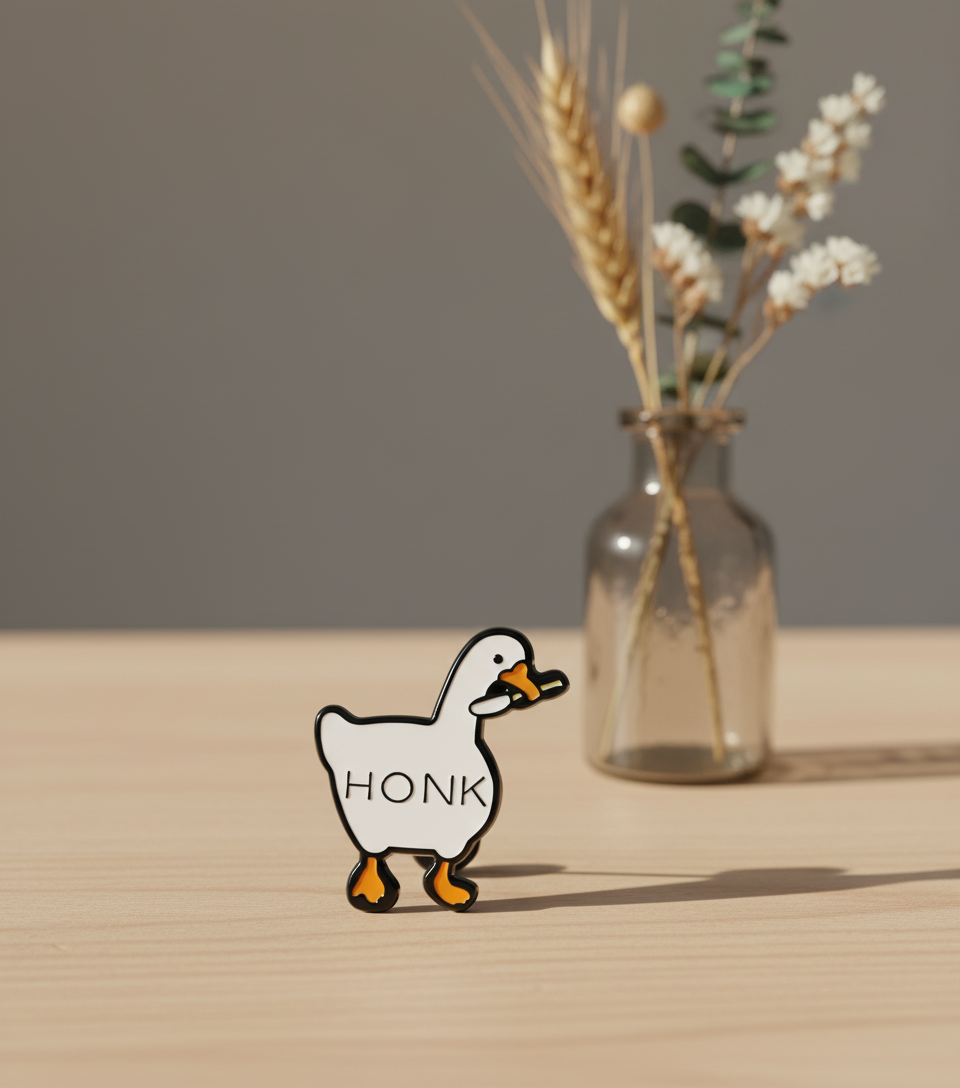 Pin's Oie avec Couteau "Honk"