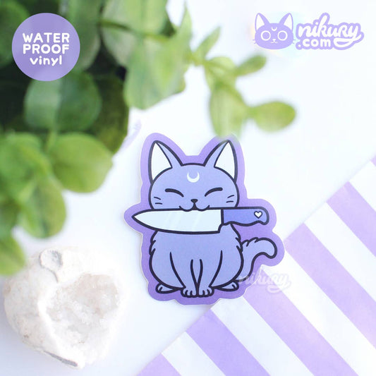 Pegatina de gato maullando negro con cuchillo