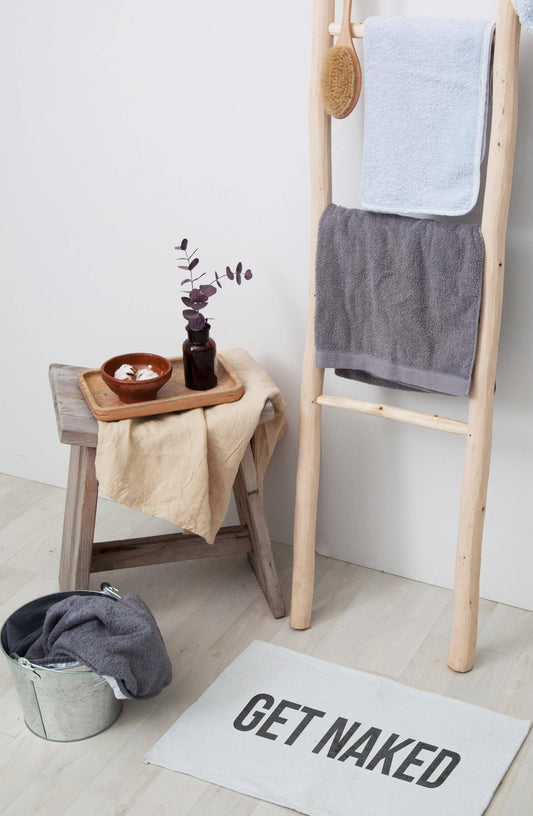Alfombra de baño "Desnúdate"