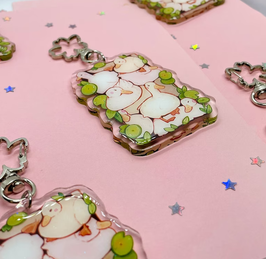 Llavero de pila de patos