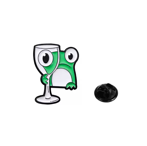 pins grenouille avec verre de vin