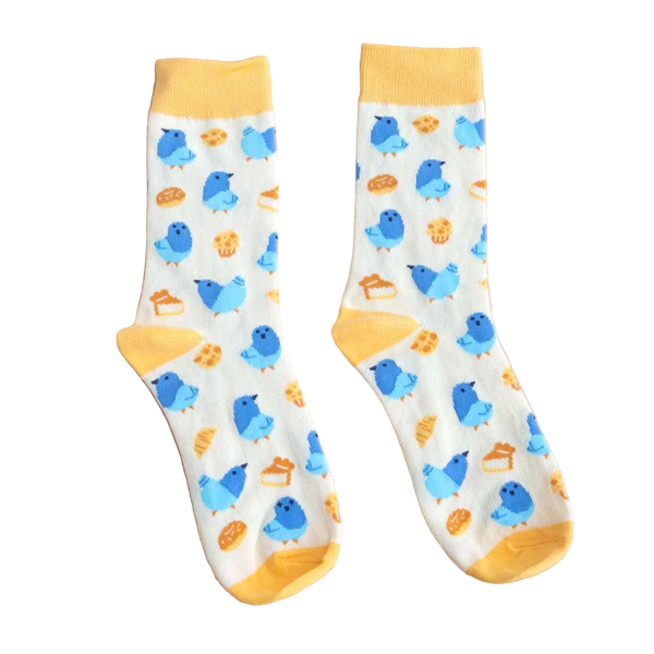 Calzini e pasticcini a forma di piccione