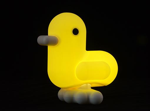Luce notturna a forma di anatra giallo pastello