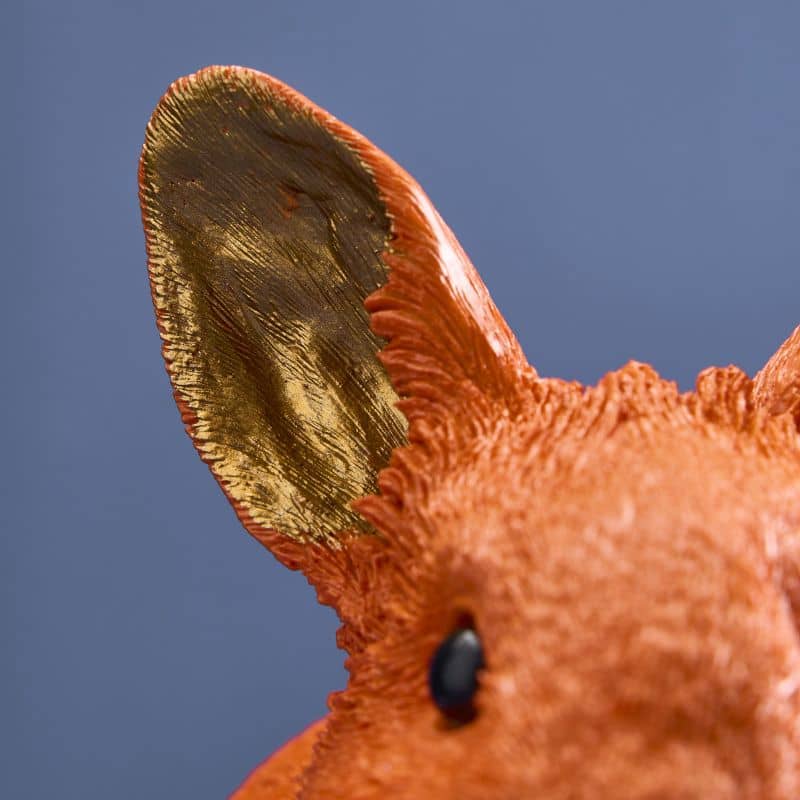 Thrifty rabbit, orange polyurethane resin, 21 x 11 x 16 cm