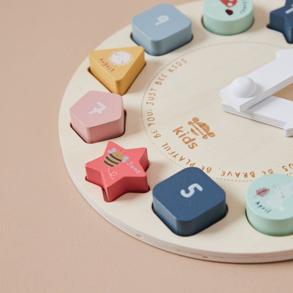 Puzzle con orologio in legno per bambini