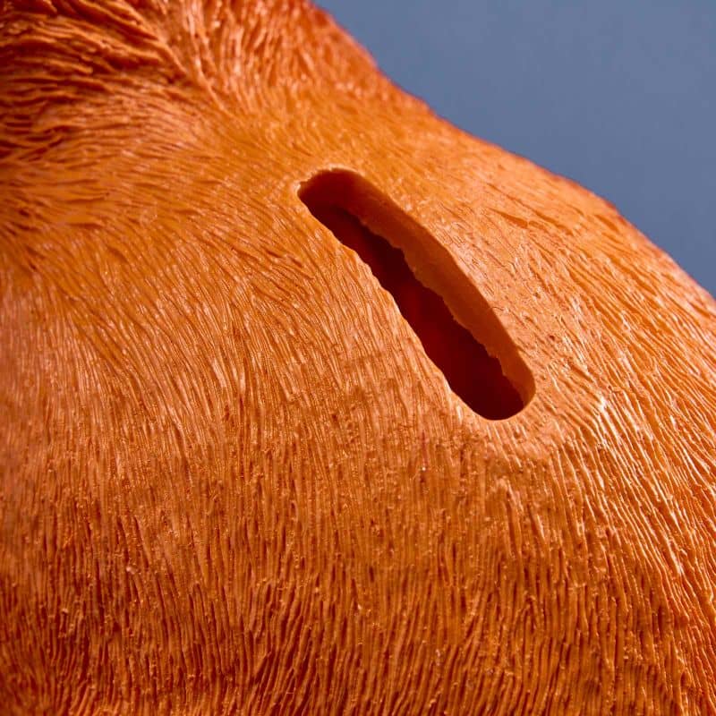 Thrifty rabbit, orange polyurethane resin, 21 x 11 x 16 cm