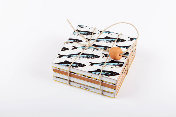 Sottobicchieri in ceramica a forma di sardina