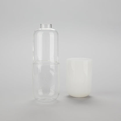 Water Pill Bottle and Drinking Glass