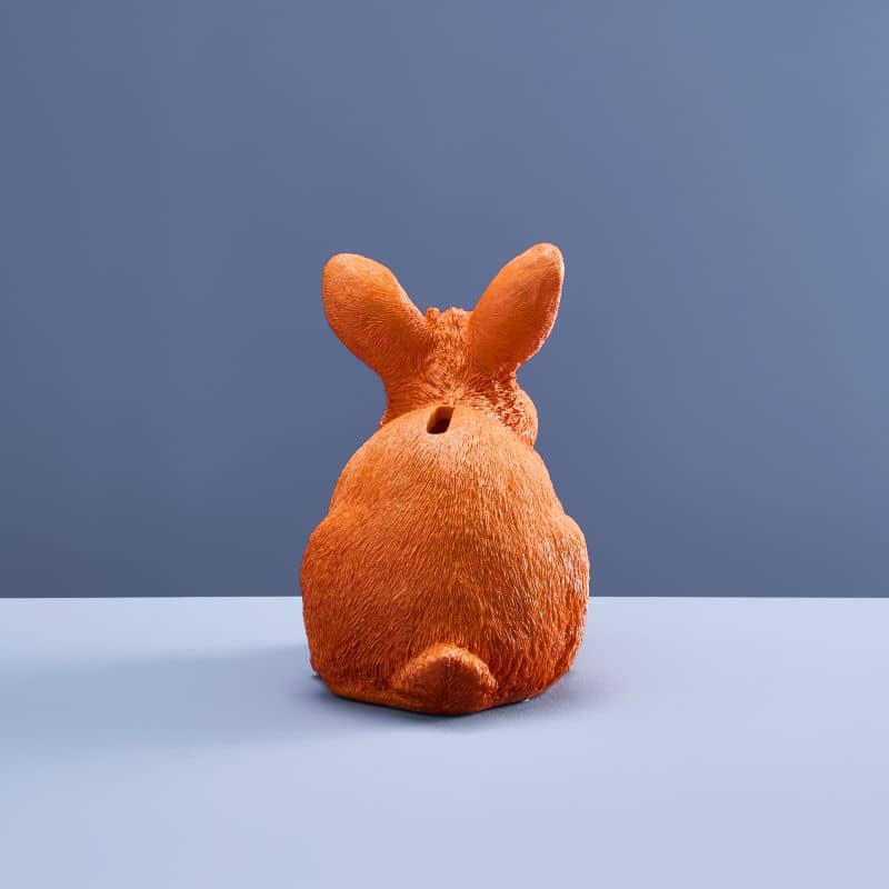 Thrifty rabbit, orange polyurethane resin, 21 x 11 x 16 cm