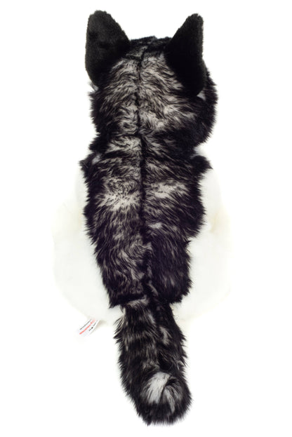 Pluche knuffel van een zittende husky