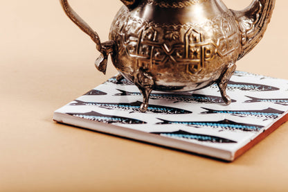 salvamanteles de sardina