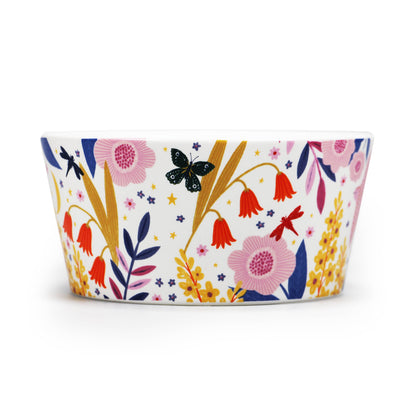 Taça em cerâmica com desenho floral, mensagem positiva e inspiradora.