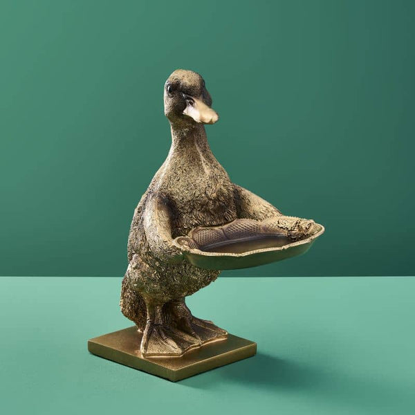 Tarjetero de resina con forma de pato dorado