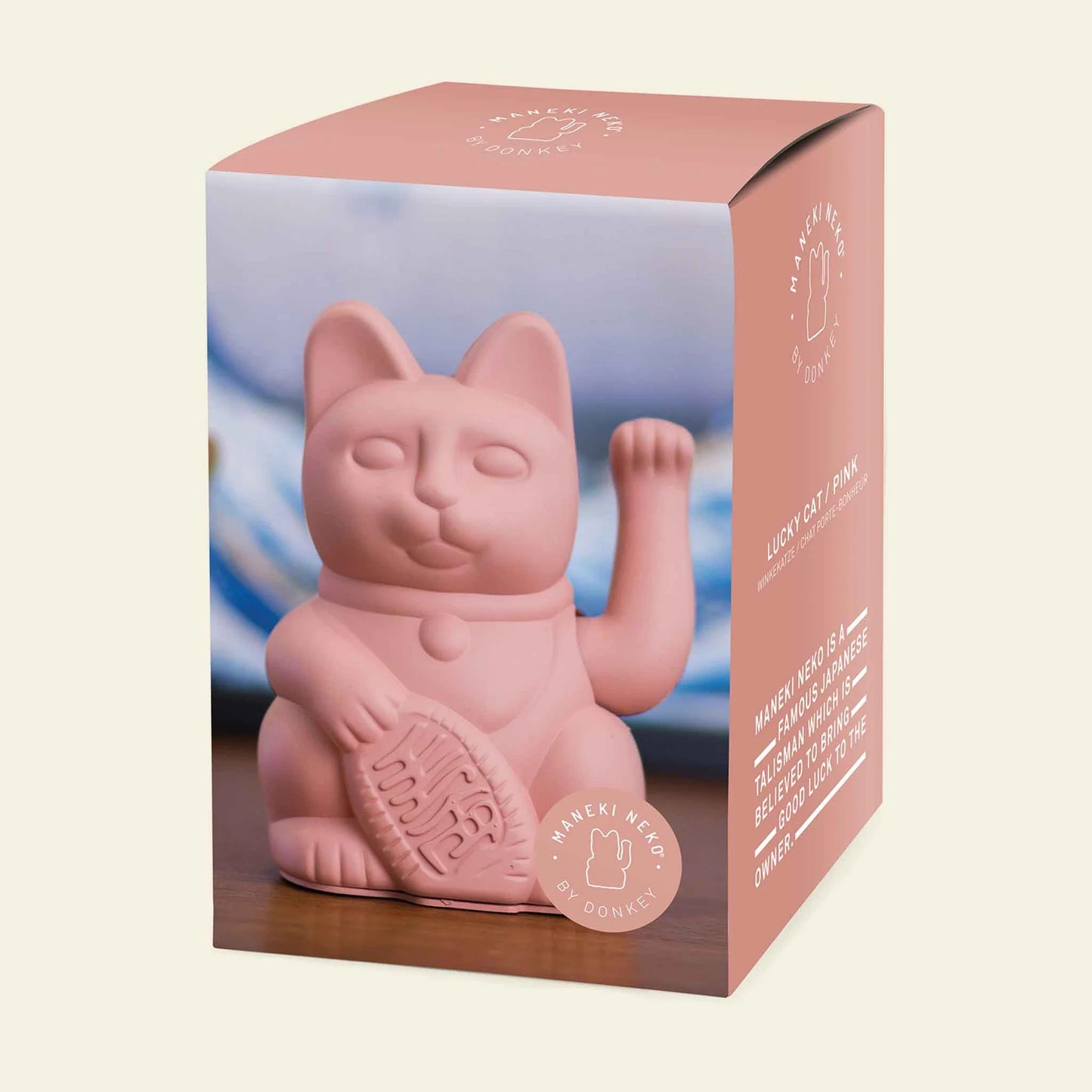 Gato rosa afortunado