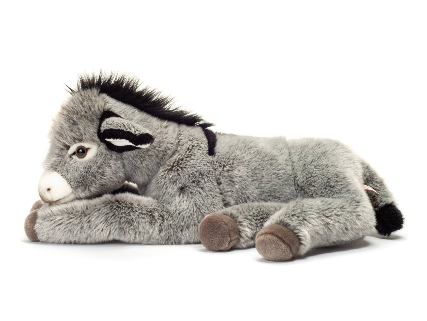 Burro de peluche acostado