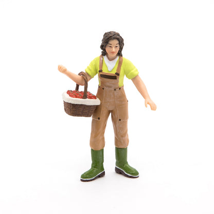 Farmer's wife with a basket figurine
