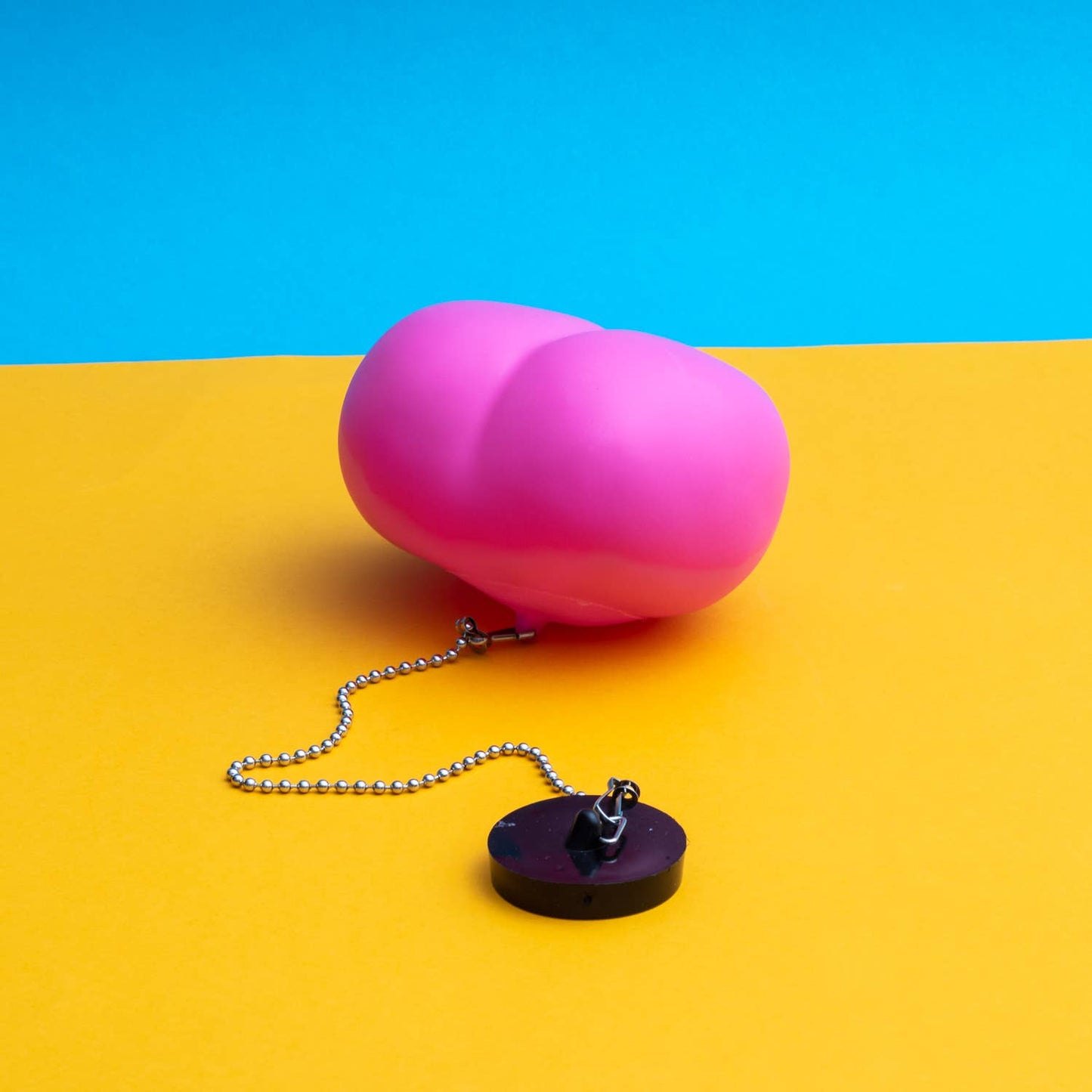 Bouchon de baignoire en forme de fesses