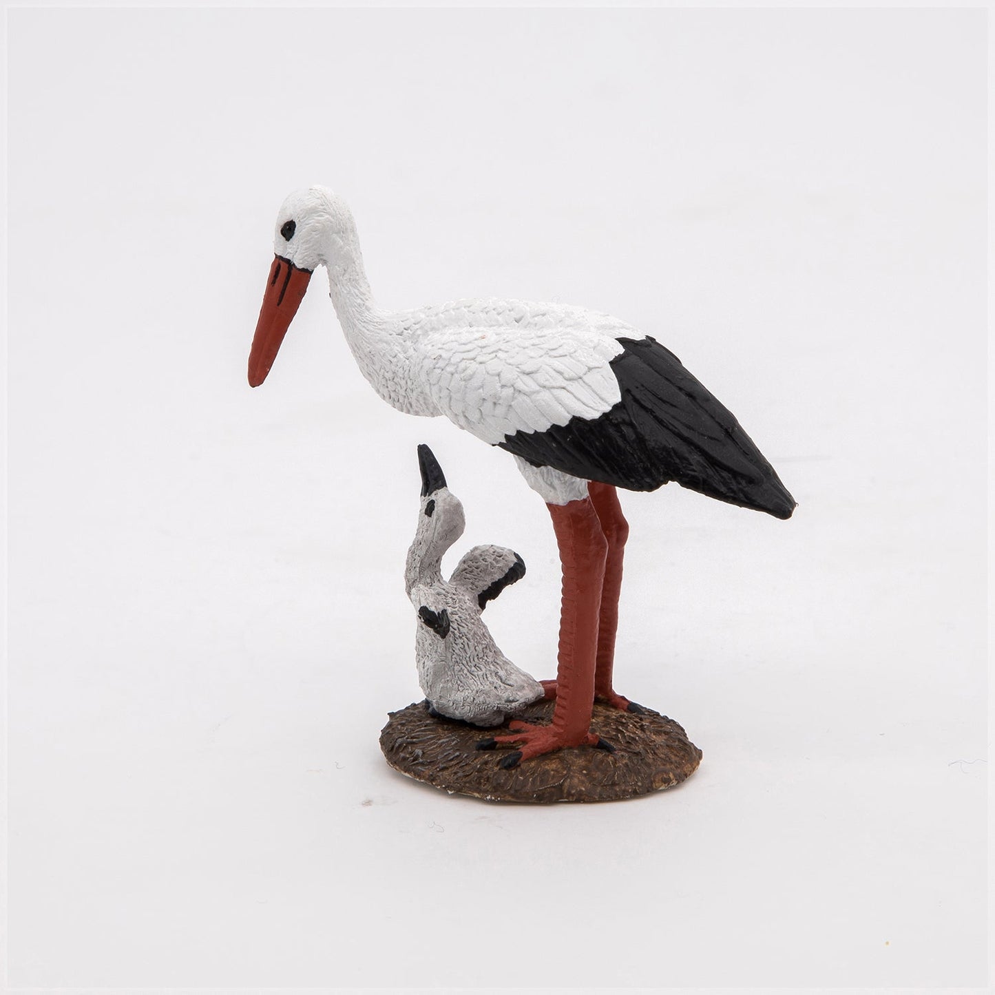 Stork and Baby Figurine