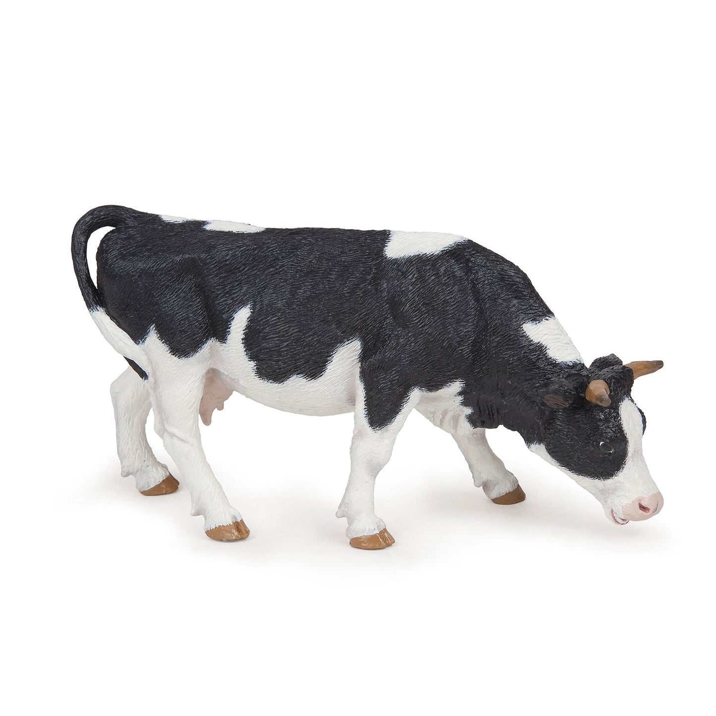 Figurine Vache noire et blanche broutant