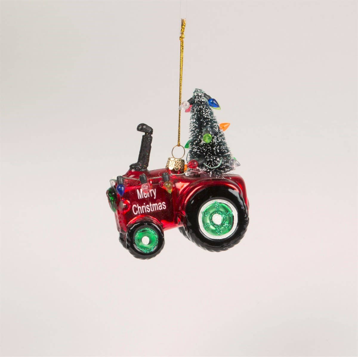 Adorno navideño de tractor festivo
