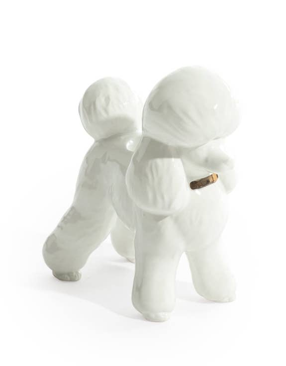 Candelabro de caniche blanco