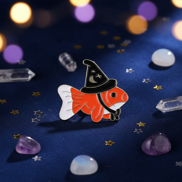 Spilla del mago del pesce rosso