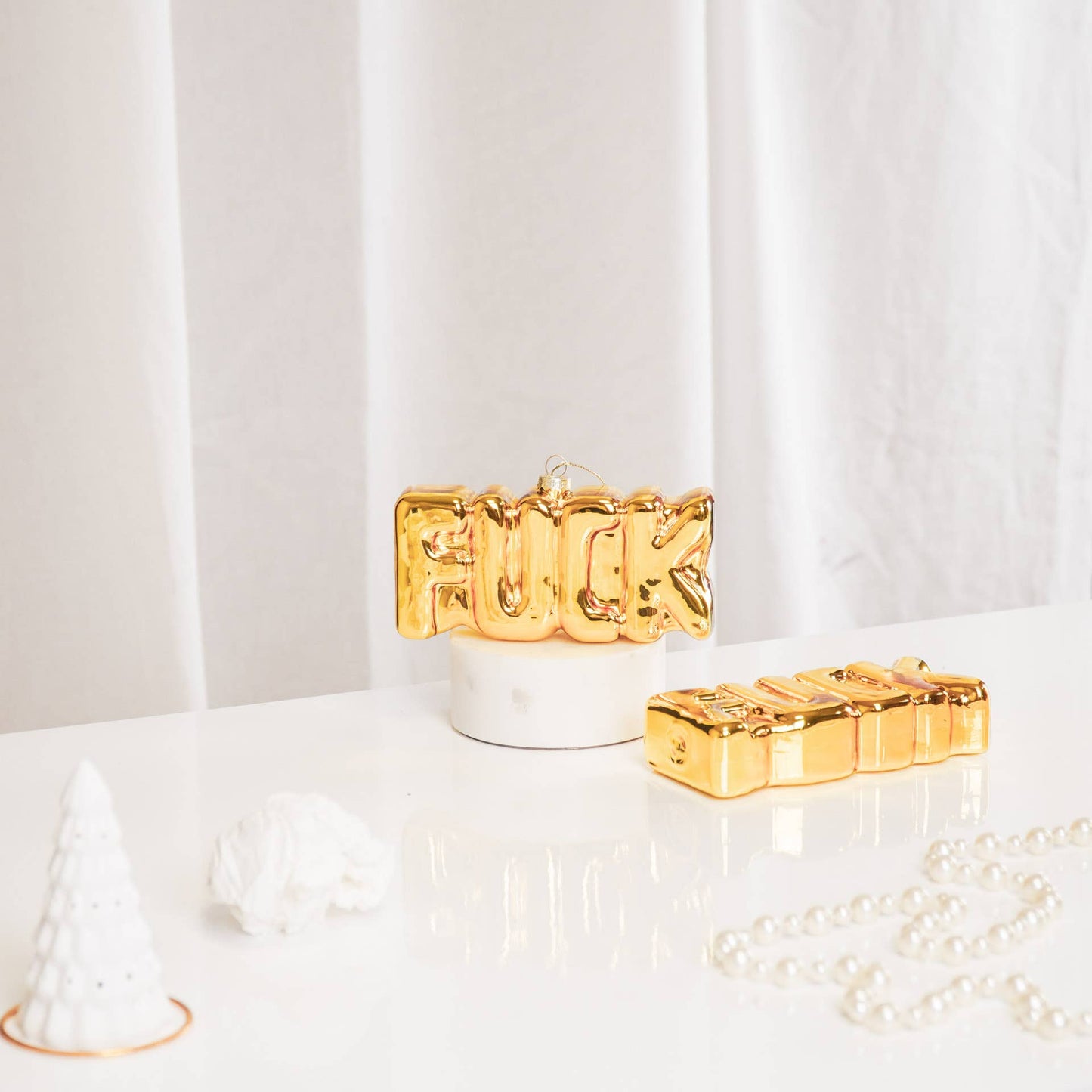 A la mierda la bola de Navidad dorada