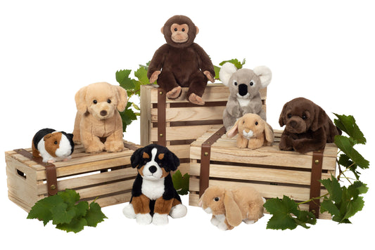 Pluche knuffel van een zittende Berner Sennenhond