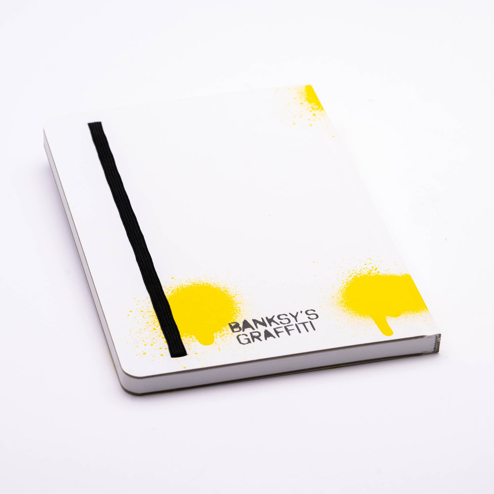 Caderno A5 com estampa de grafite do Banksy em papel Stone Paper - Menina Voadora