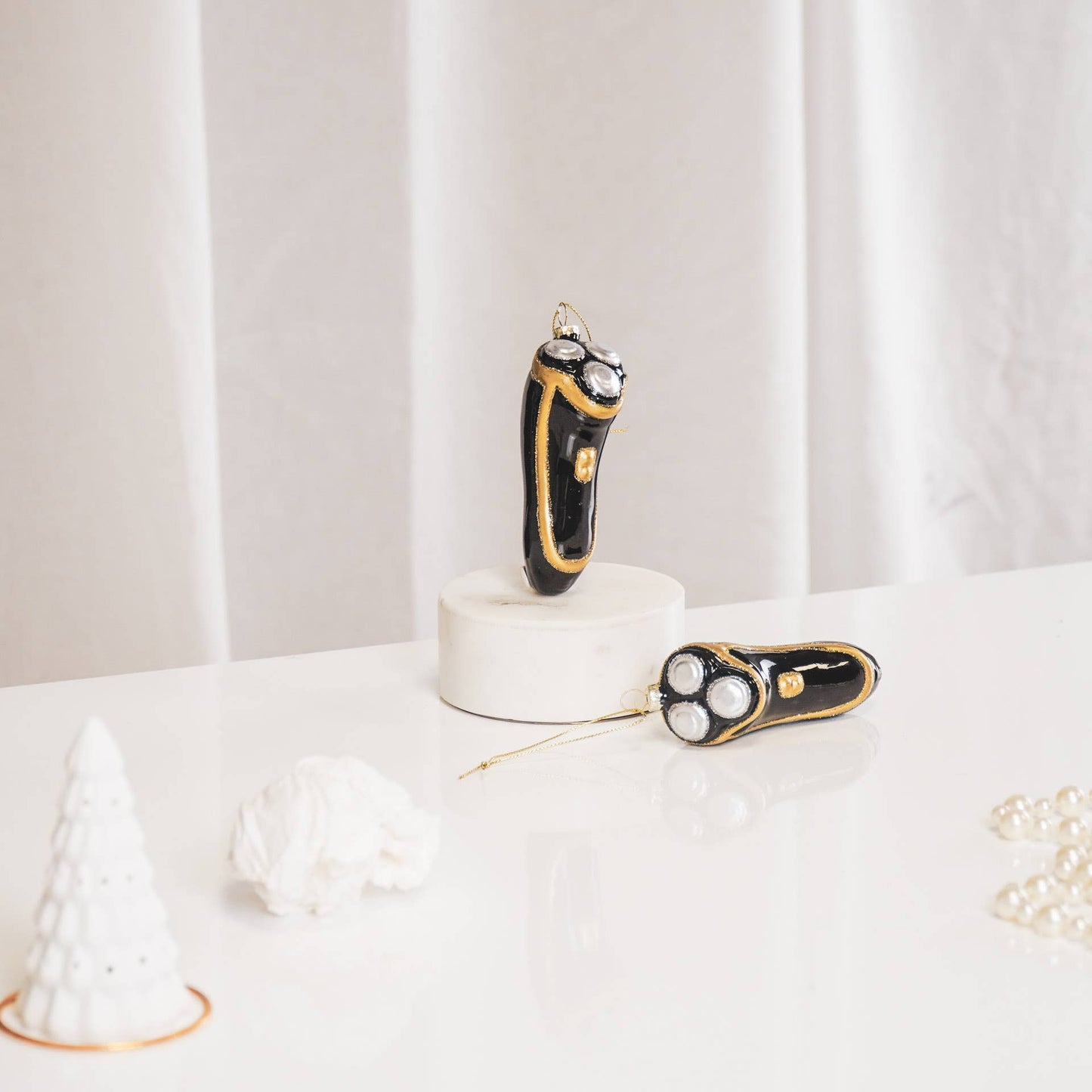 Bola de Navidad de afeitadora eléctrica