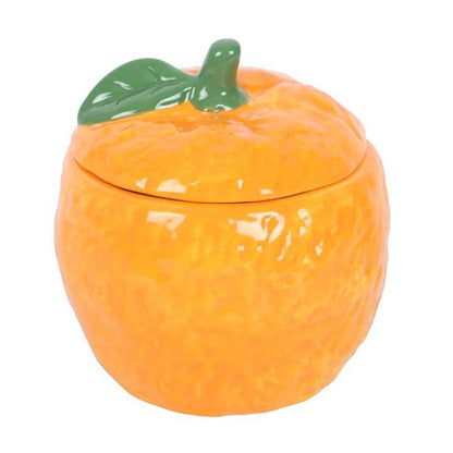 Oil burner shaped like a freshly picked orange