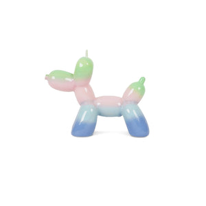 Candela a forma di cane con palloncino all'alba