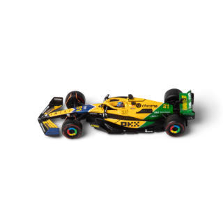 1:43 F1 MCLAREN MCL38 2024 AVEC CASQUE LIVRÉE PIASTRI SENNA