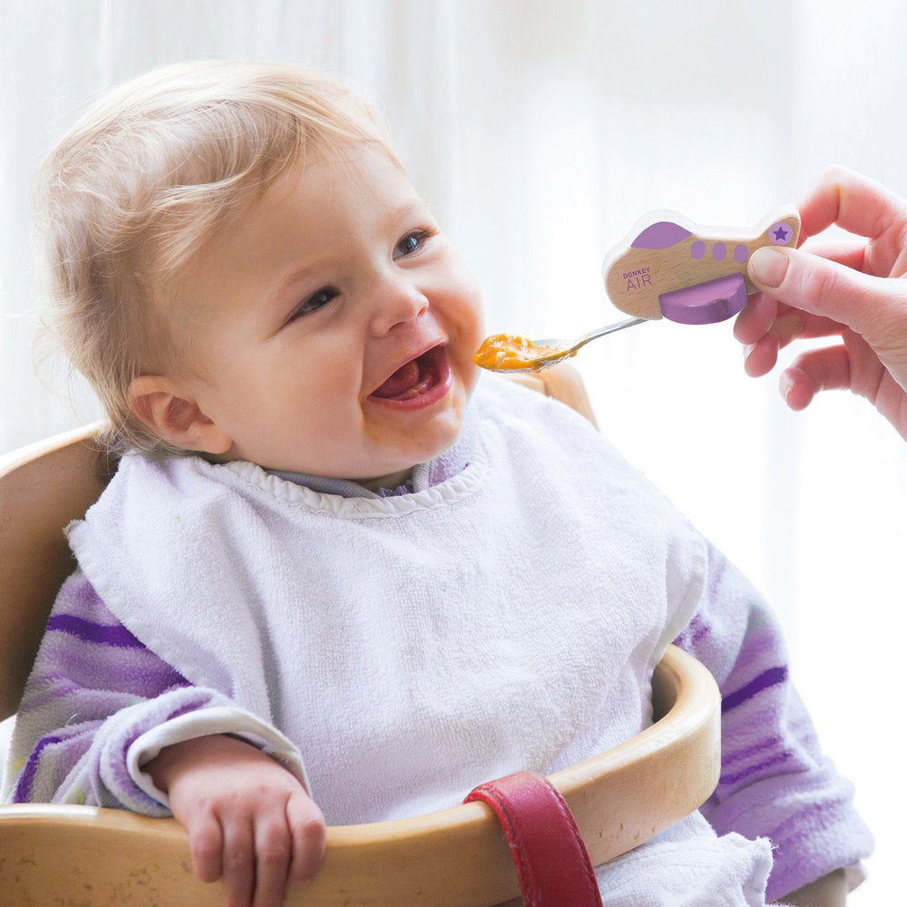 Kinderlepel met paars vliegtuigontwerp
