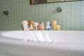 Set de 6 animales árticos – Sonajero, mordedor y baño