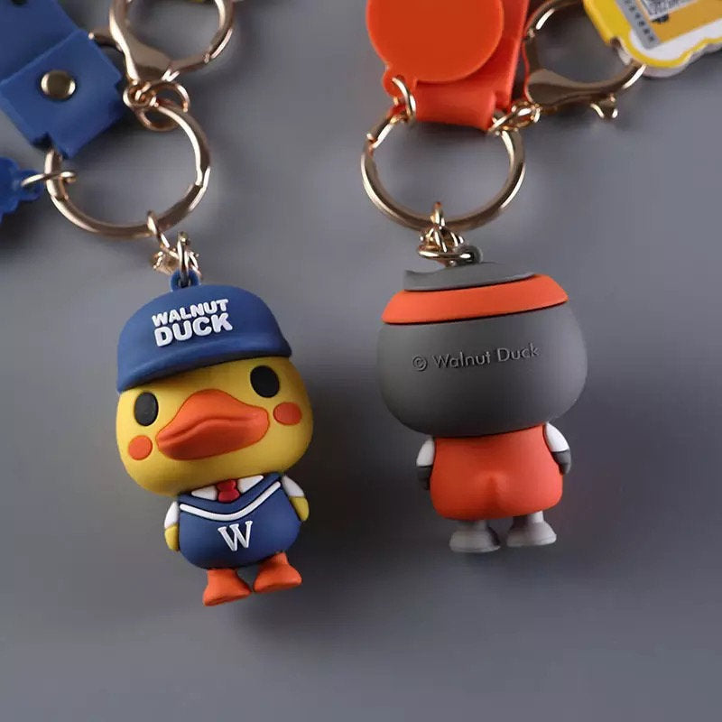 Llavero pato deportista