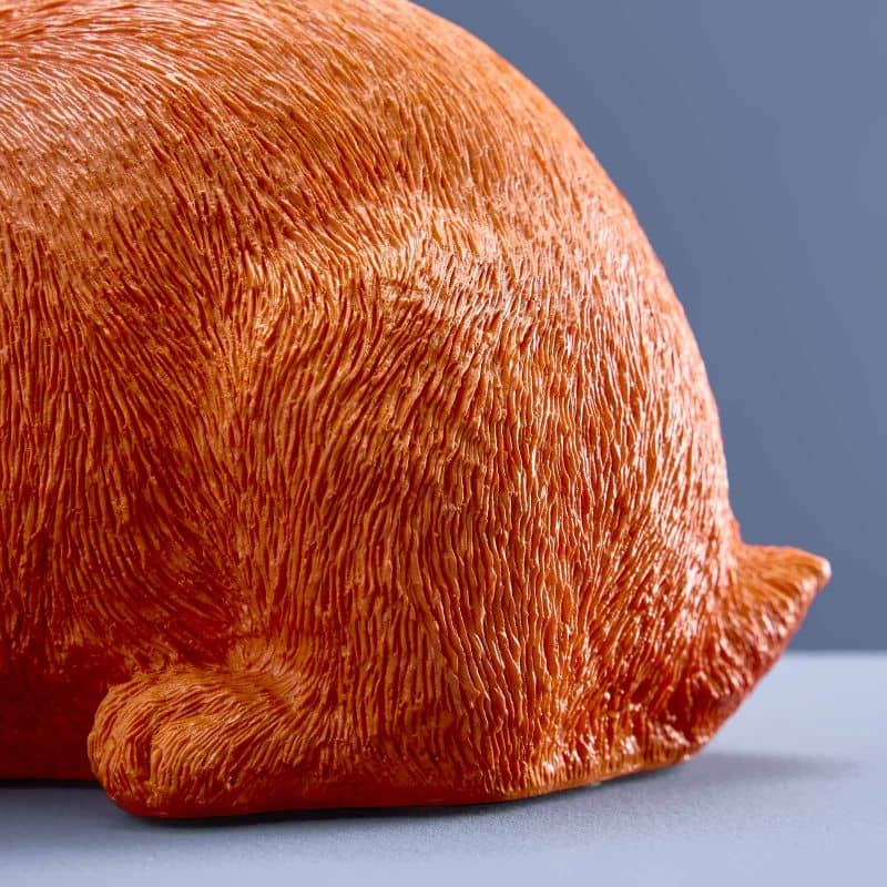 Thrifty rabbit, orange polyurethane resin, 21 x 11 x 16 cm