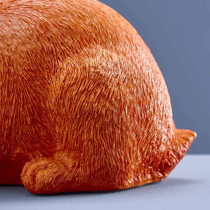 Thrifty rabbit, orange polyurethane resin, 21 x 11 x 16 cm