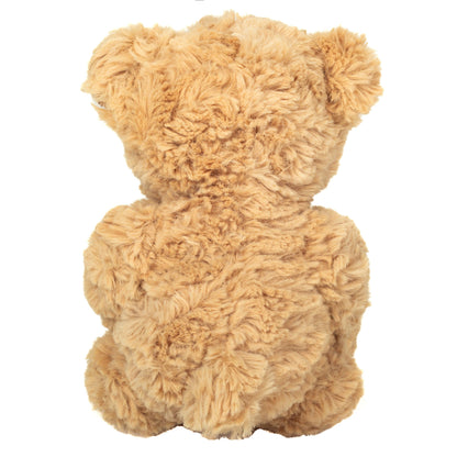 Beige teddy bear with a heart