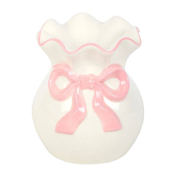 Brûleur d'huile blanc et rose avec nœud