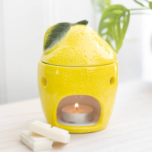 Lemon-colored oil burner with lid