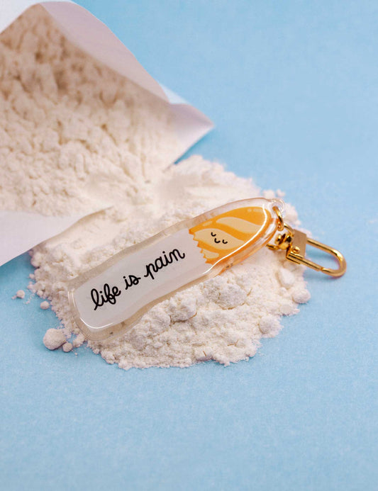 Porte-clés en – acrylique « Life is Pain » Baguette | Joanna Behar – vue 2
