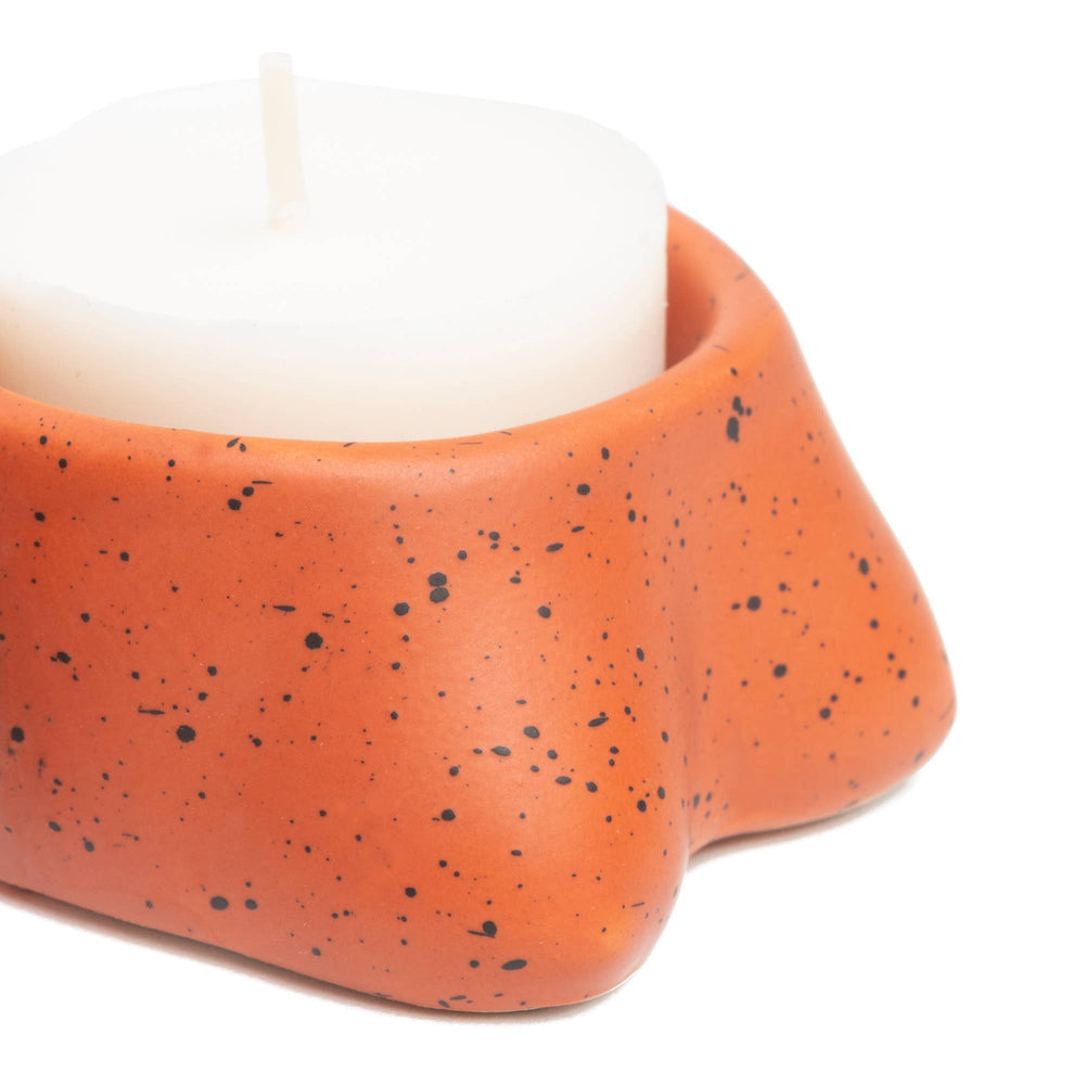 Portacandele a forma di piccole tette in terracotta