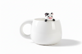 Mug with Cow Figurine