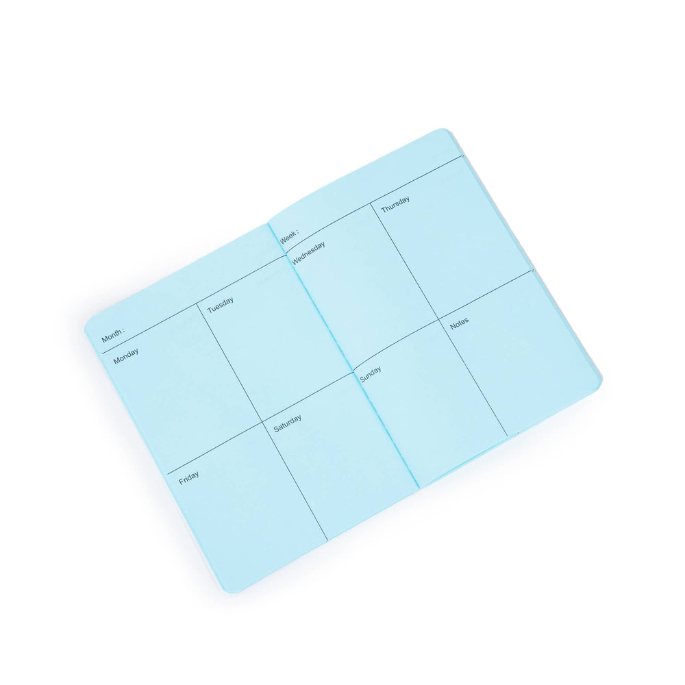 A6-planner met lichtblauwe paddenstoelen
