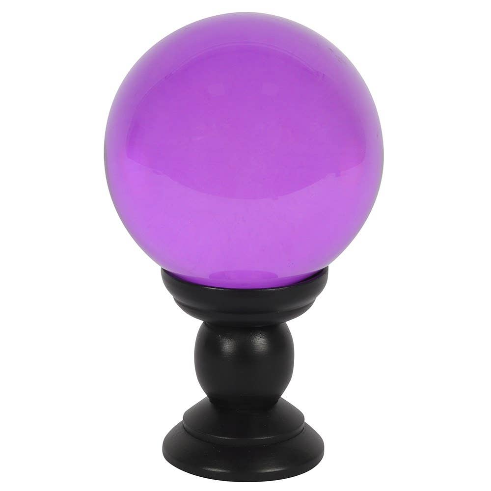 Gran bola de cristal violeta sobre soporte
