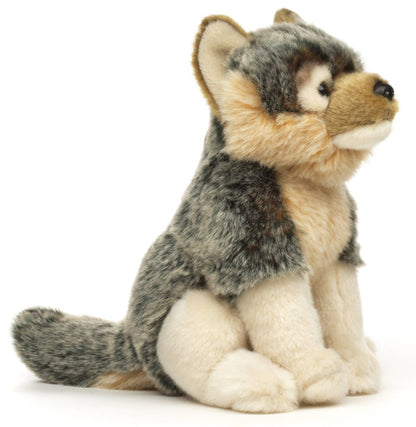 Graues Wolfsjunges als Plüschtier, sitzend